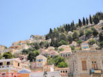 Huizen op berghelling - Eiland Symi - Foto van De Griekse Gids