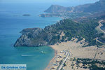 Tsambika Rhodos met daarachter Stegna - Rhodos Dodecanese - Foto van De Griekse Gids